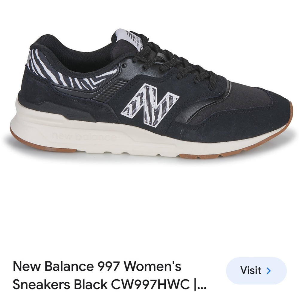 New Balance Women's Black Athletic Sneakers with White Zebra Accent